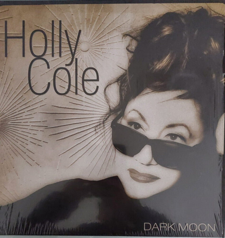 the album cover for Holly Cole - Dark Moon (Can)