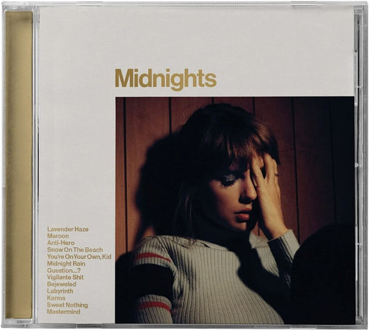 the album cover for Taylor Swift - Midnights [Mahogany Edition]