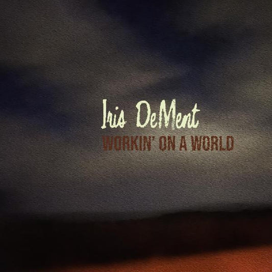 the album cover for Iris DeMent - Workin' On A World