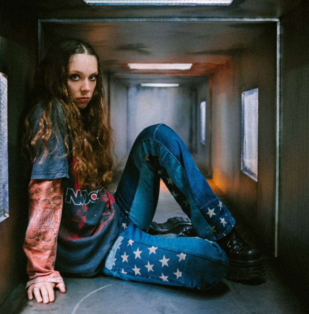 the album cover for Holly Humberstone - The Walls Are Way Too Thin [Indie Exclusive Limited Edition Clear LP]
