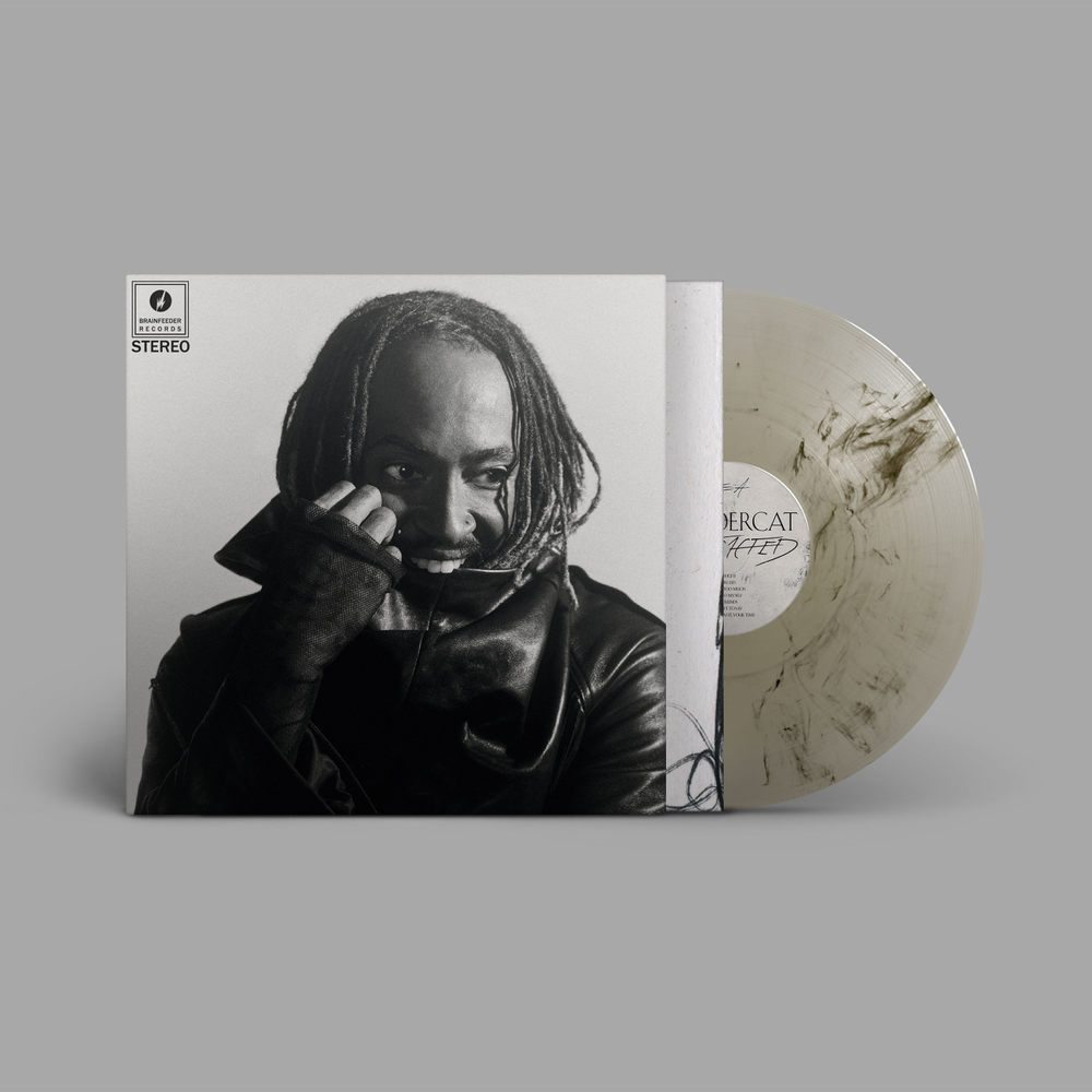 the album cover for Thundercat - Distracted [Indie Exclusive Black Marbled Smoke Effect]