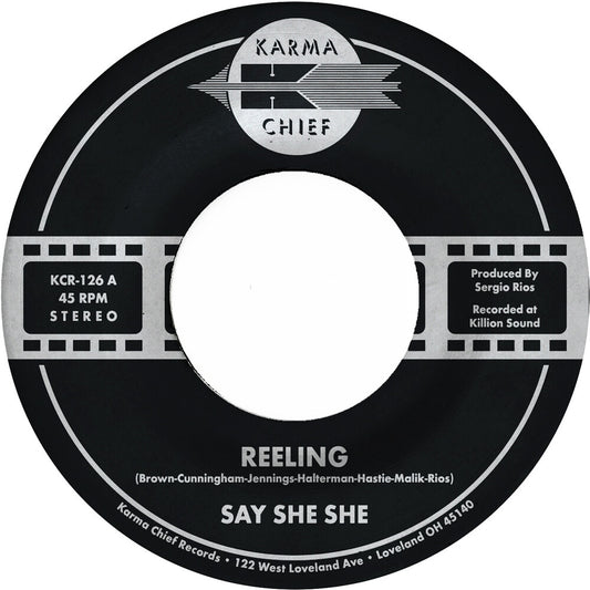 the album cover for Say She She - Reeling / Don't You Dare Stop