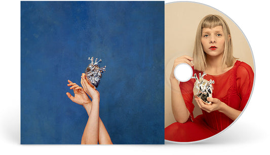the album cover for Aurora -  What Happened To The Heart? [CD]