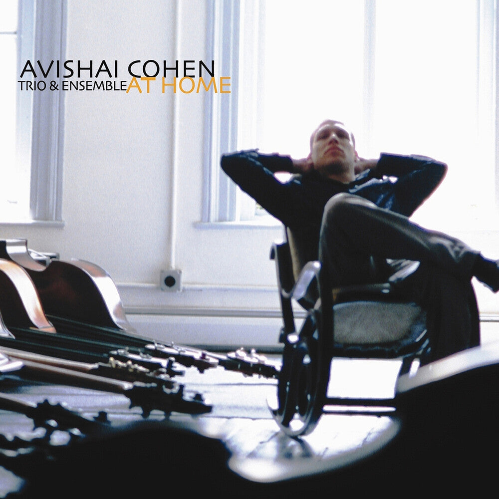 the album cover for Avishai Cohen  / Guiliana,Mark / Tzur,Tomer - At Home
