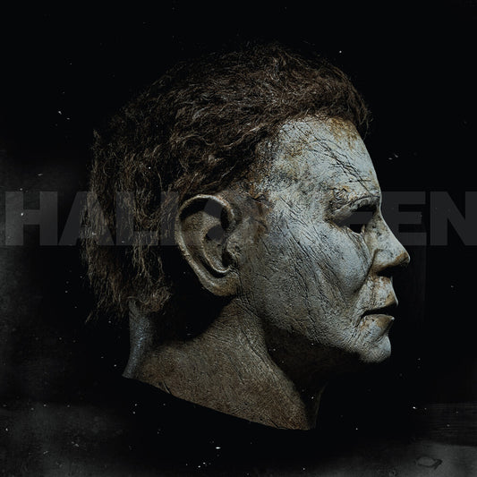 the album cover for John Carpenter - Halloween (Expanded Art Edition) - O.S.T. [Colored Vinyl]