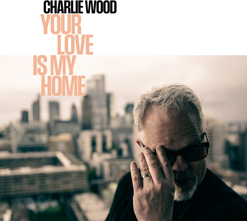 the album cover for Charlie Wood - Your Love Is My Home