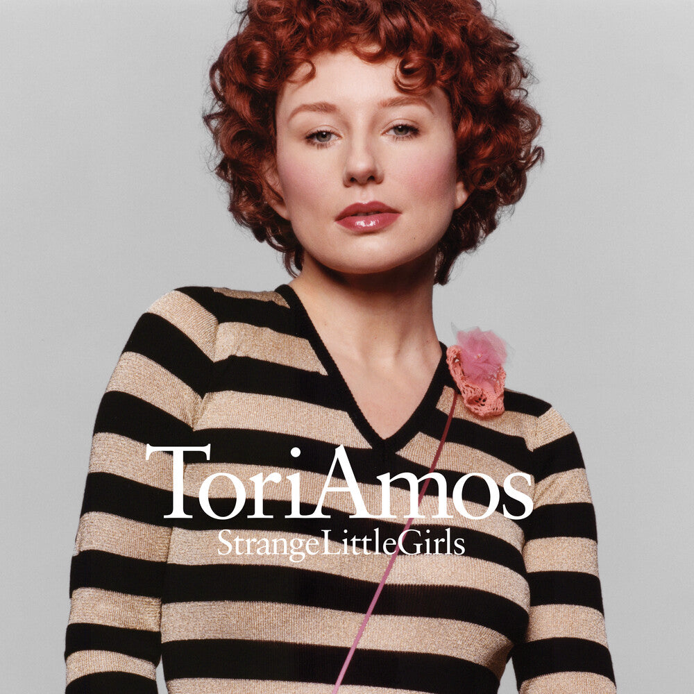 the album cover for Tori Amos - Strange Little Girls [Time Version]