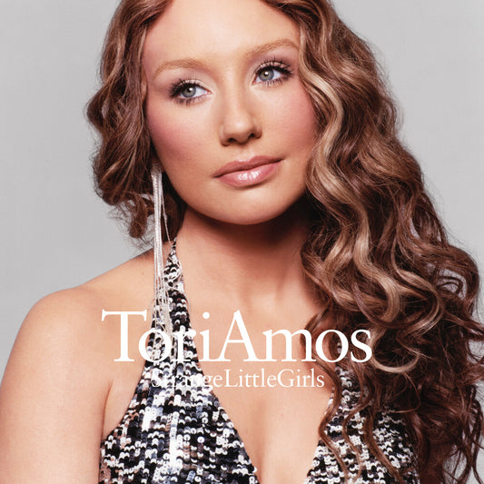 the album cover for Tori Amos - Strange Little Girls [Happiness Is A Warm Gun Version]