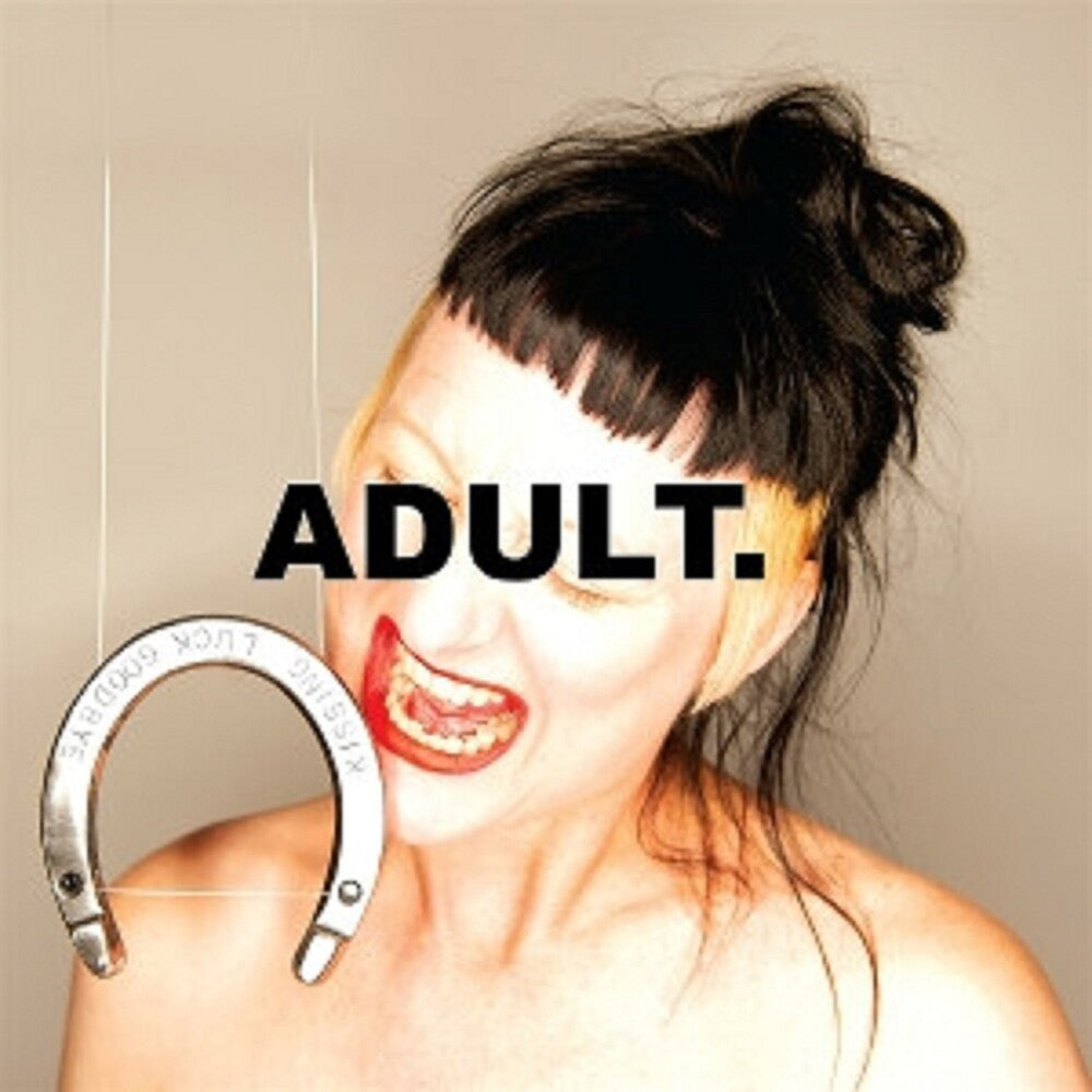 the album cover for ADULT. - Kissing Luck Goodbye