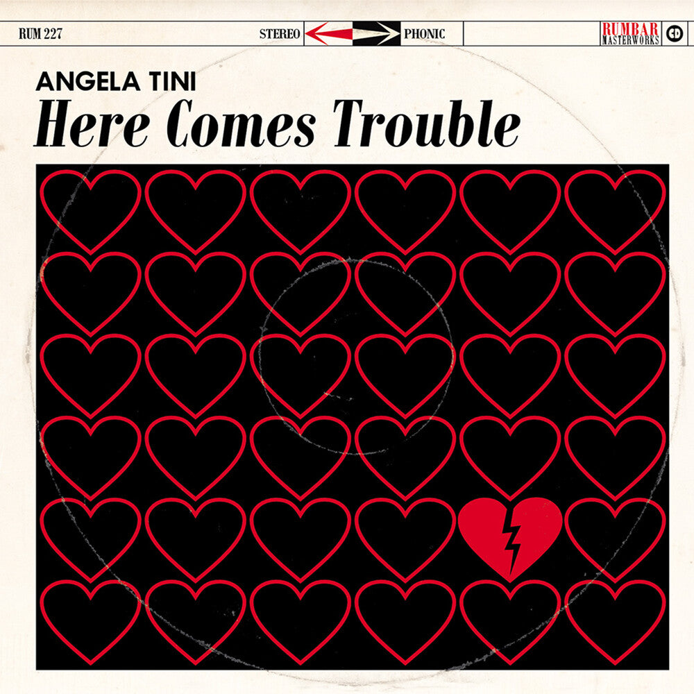 the album cover for Angela Tini - Here Comes Trouble [Deluxe] (Post)